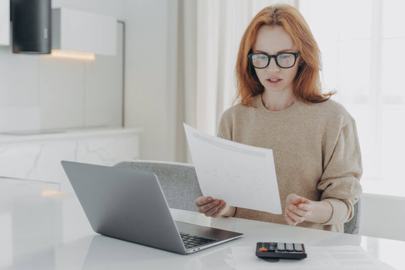 female calculating finances